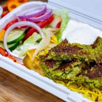 Falafel Over Rice Platter · Vegetarian. Our speciality falafel served with basmati rice, lettuce, tomatoes, onions, swee...