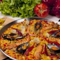 Paella De Camarones (Shrimp) · Shrimp Paella. Shrimp, tomato sofrito, Arborio rice, market vegetables. Made-to-order, pleas...