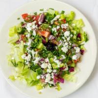 Shirazi Salad · Diced cucumbers, tomato, onions, with homemade vinaigrette. (add feta $1 extra)