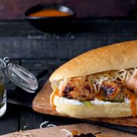 Buffalo Chicken Sandwich · Our delicious Tawook marination, melted cheddar cheese, pickles with buffalo sauce and mayo ...
