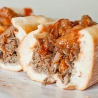 Chicken Cheese Steak · Footlong Sandwich, cooked with peppers and onions, with White American Cheese. Topped with M...