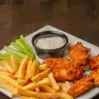 Alitas De Pollo Picante Con Arroz With Papas Fritas · Spicy chicken wings with rice and french fries.