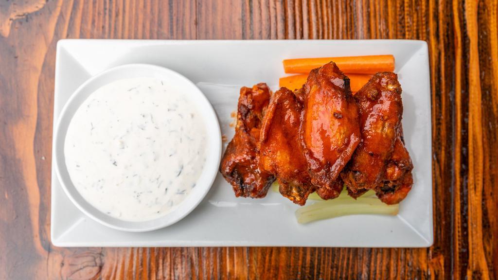 Spicy Party Chicken Wings · Celery, Carrots & Blue Cheese Dipping Sauce