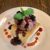 Tres Leches Cake · With Blackberry Ice Cream Topped with Berry Sauce