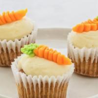 Carrot Cake Cupcake · Sweet and spiced carrot cake topped with smooth cream cheese frosting.