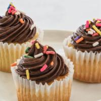 Chocolate On Top Cupcake · Classic vanilla cake with chocolate ganache buttercream.