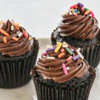 Double Chocolate Cupcake · Rich chocolate cake covered in chocolate ganache buttercream.