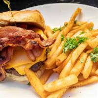The Neptune'S Bacon Cheeseburger · Classic burger with bacon, cheddar cheese, grilled onions, lettuce, tomato. Served with Nept...