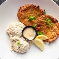 Crab Cakes · Two fresh crab cakes. Served with two sides.