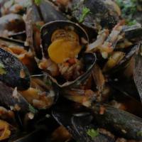 Mussels Marinara · Mussels sautéed in fresh garlic and olive oil simmered in marinara sauce or white wine sauce...