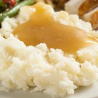 Garlic Mashed Potatoes · Buttery delicious Mashed potatoes, topped with garlic seasoning.