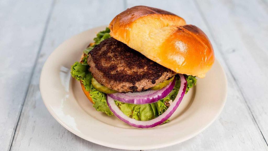 Classic Grass Fed Beef Burger · 4oz beef patty, lettuce, tomato, pickle, onion on brioche bun