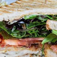 Chicken Club Sandwich · Grilled chicken breast, smoked bacon, lettuce, tomato and chipotle mayo. On toasted sourdoug...
