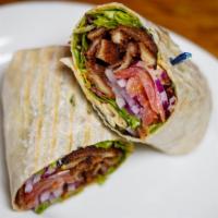 Chicken Milanese Wrap · Breaded chicken breast, lettuce, tomato, onion, chipotle mayo wrapped in a flour tortilla.