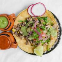 Oyster Mushroom Taco · Oyster gilled mushrooms with herbs and corn