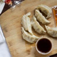 Steamed Dumplings (8 Pieces) · Choice of 8 pieces.