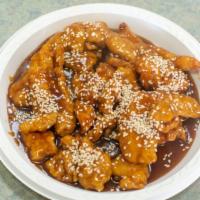 Sesame Chicken · Served with pork fried rice and egg roll.