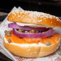 Sliced Nova Lox & Cream Cheese · Sliced smoked salmon, red onions, capers, plain cream cheese on a bagel.Served with pickle a...