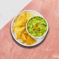Guacamole & Chips · A heaping scoop of fresh guacamole and fresh fried tri-colored corn tortilla chips.