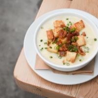 New England Clam Chowder · chopped atlantic surf clams, smoky bacon, croutons
