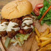 Falafel Burger · Chickpeas, onion, parsley and garlic powder, patty served with iceberg lettuce, beefsteak to...