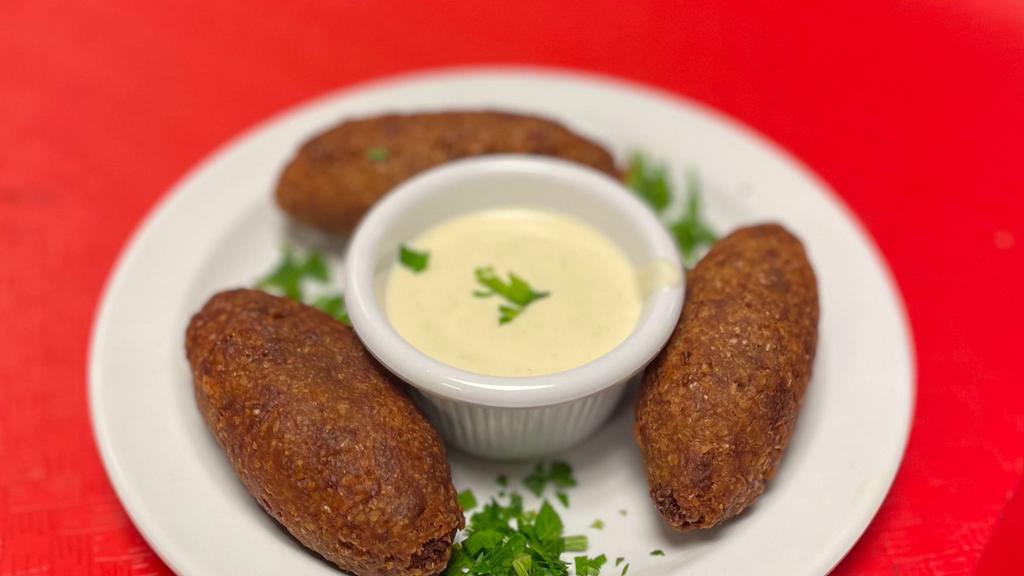 Kibbeh (3 Pieces) · Bulgur rolled into a ball filled with ground beef onions, pine nuts.