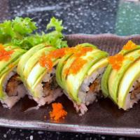 Dragon Roll · Eel, cucumber inside, topped with avocado and masago & eel sauce