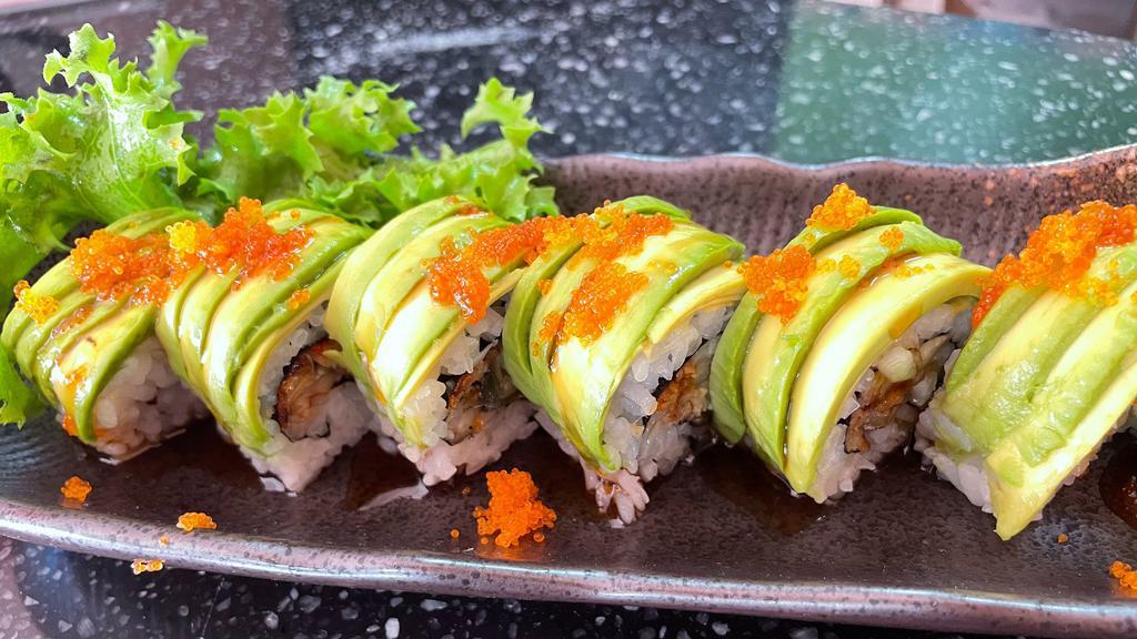 Dragon Roll · Eel, cucumber inside, topped with avocado and masago & eel sauce