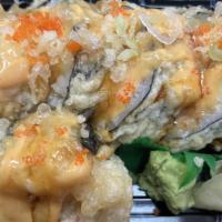 Godzilla Roll · White fish, cream cheese, spicy tuna, tamago & avocado, top with eel sauce & spicy mayo