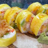 Super Duper · Shrimp tempura, crab tempura, mango, avocado, cucumber wrapped in yellow soybean with mango ...