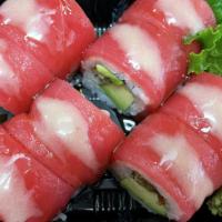 Redskin Roll · Eel avocado inside w tuna, eel sauce on top