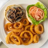 Mushroom And Swiss Burger · Comes with sautéed mushrooms and melted Swiss cheese, lettuce and tomato, French fries, home...