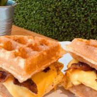 Waffle Sandwich · Bacon or sausage egg and cheese on a waffle & maple syrup.