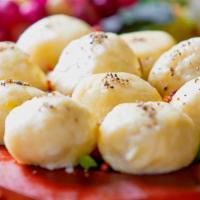 Meat Dumplings (Package) · These larger, handmade dumplings are made from potato dough stuffed with ground pork meat, r...