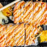 Lion Roll · Inside: fried shrimp tempura, eel, cucumber, avocado. Outside: crab meat.