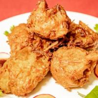 Onion Bhaji · Fried onions smothered in a simple, fragrantly spiced batter.