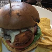 Chicken Cutlet Sandwich · Lightly bread chicken breast, with lettuce, tomato, and special house sauce on a lightly toa...