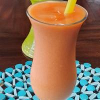 Mango Cherry Smoothie · Made with fruit, soy or almond milk, and ice.
