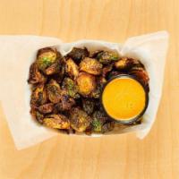 Crispy Brussel Sprouts · with sesame-tahini