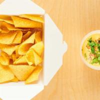 Queso & Chips · zesty cheese sauce with warm tortilla chips