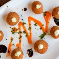 Cheese Croquettes · Goat and Parmesan cheese, blue cheese, green and red peppers.