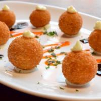 Bacalao Croquettes · Balsamic reduction and garlic aioli.