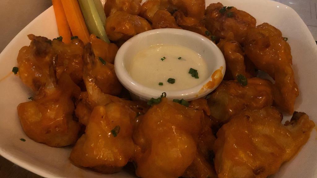 Crispy Cauliflower · Gluten free. Cauliflower bites tossed in our brown butter buffalo sauce, buttermilk dolce Gorgonzola cream. Served with celery and carrots.
