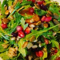 Harvest Salad · Arugula, roasted butternut squash, farro apples, cranberries, pumpkin seeds, pomegranate see...