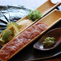Tuna Tartare · Japanese style tartare topped with diced avocado,
scallions, dried seaweed, wasabi, tosa soy...
