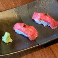 Wagyu Sushi · 2 pieces
Wagyu beef sashimi with garlic soy