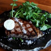 Filet Mignon 14Oz · chef selected USDA filet mignon with herb lemon butter, soy lemon onion sauce, and wasabi cr...