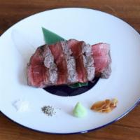 Japanese Prime Wagyu Steak · 12 oz.
A5 Wagyu beef from Japan, soy lemon onion sauce, wasabi on the side.