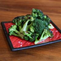Grilled Broccoli · With garlic anchovy and homemade hollandaise sauce.