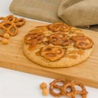 Salted Caramel Pretzel · This is for our salty and sweet folks! This chocolate chip cookie is filled with a Salted Ca...